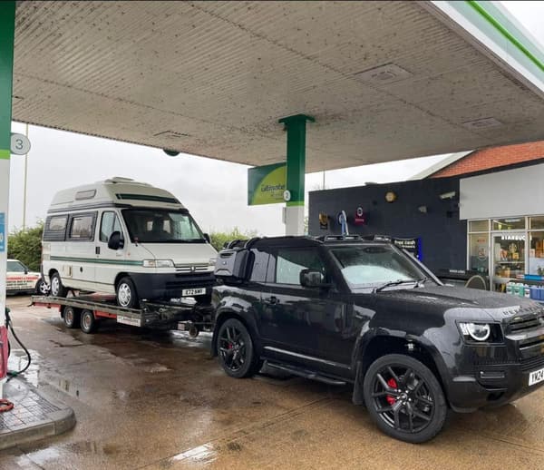Campervan on transporter